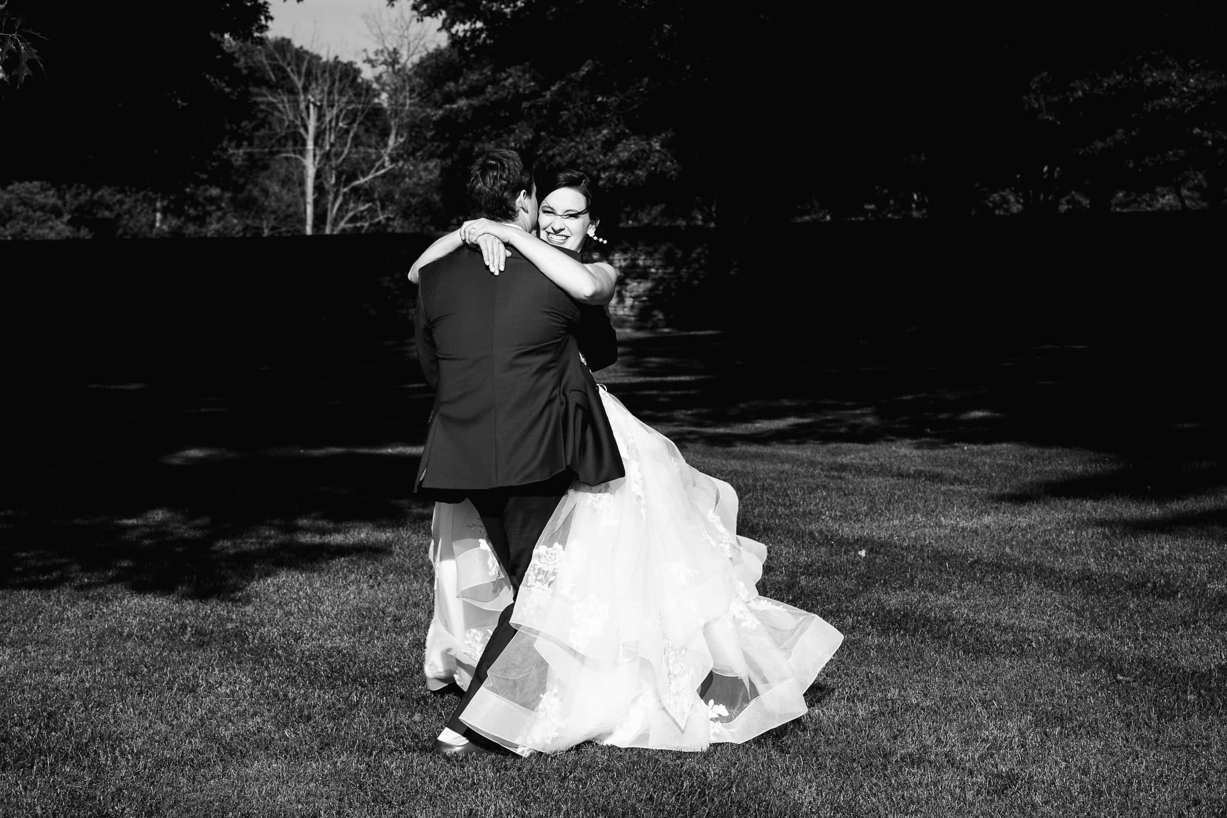 Bride And Groom Twirling At Fasig-Tipton