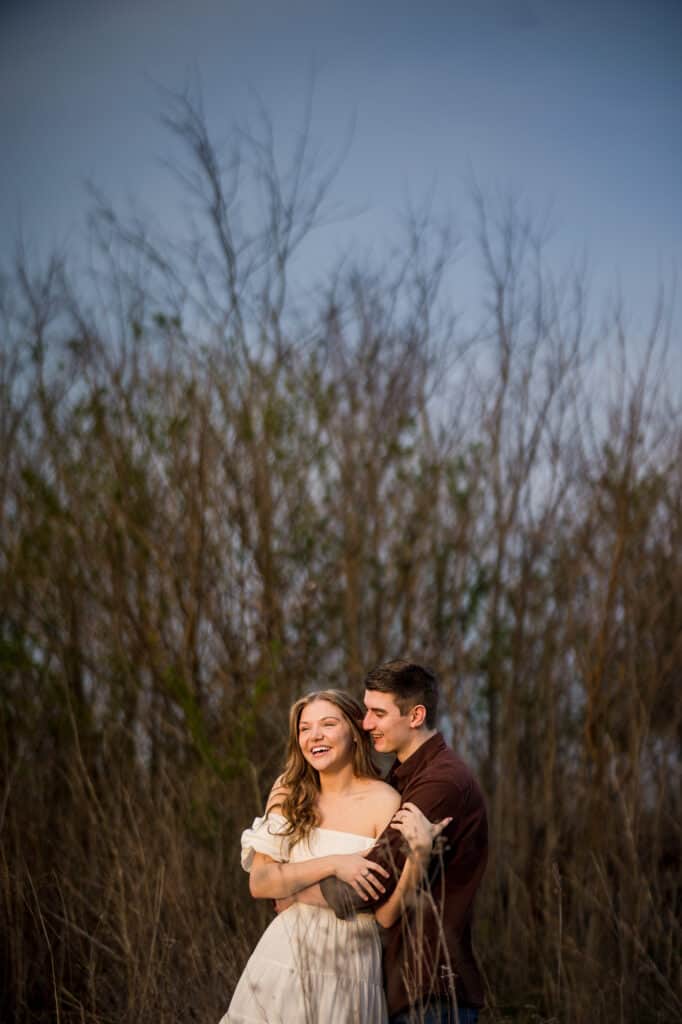 couple in tall grass at shaker village in winter