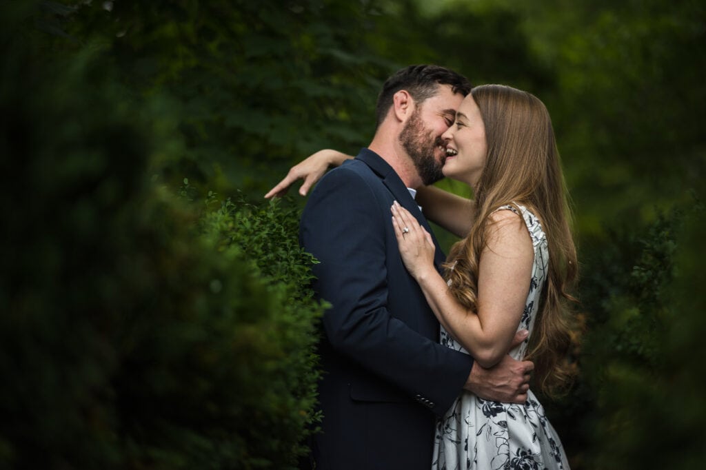 A couple kisses during their engagement session in Frankfort, KY.