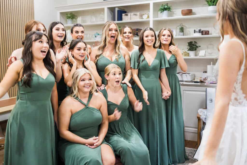 A group of bridesmaids in green dresses at the Harper Hall Wedding.