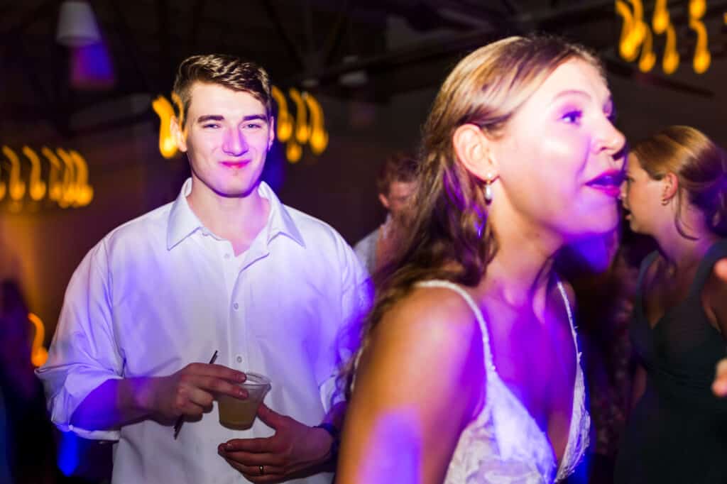 Harper Hall Wedding: A bride and groom joyfully dancing at the reception.