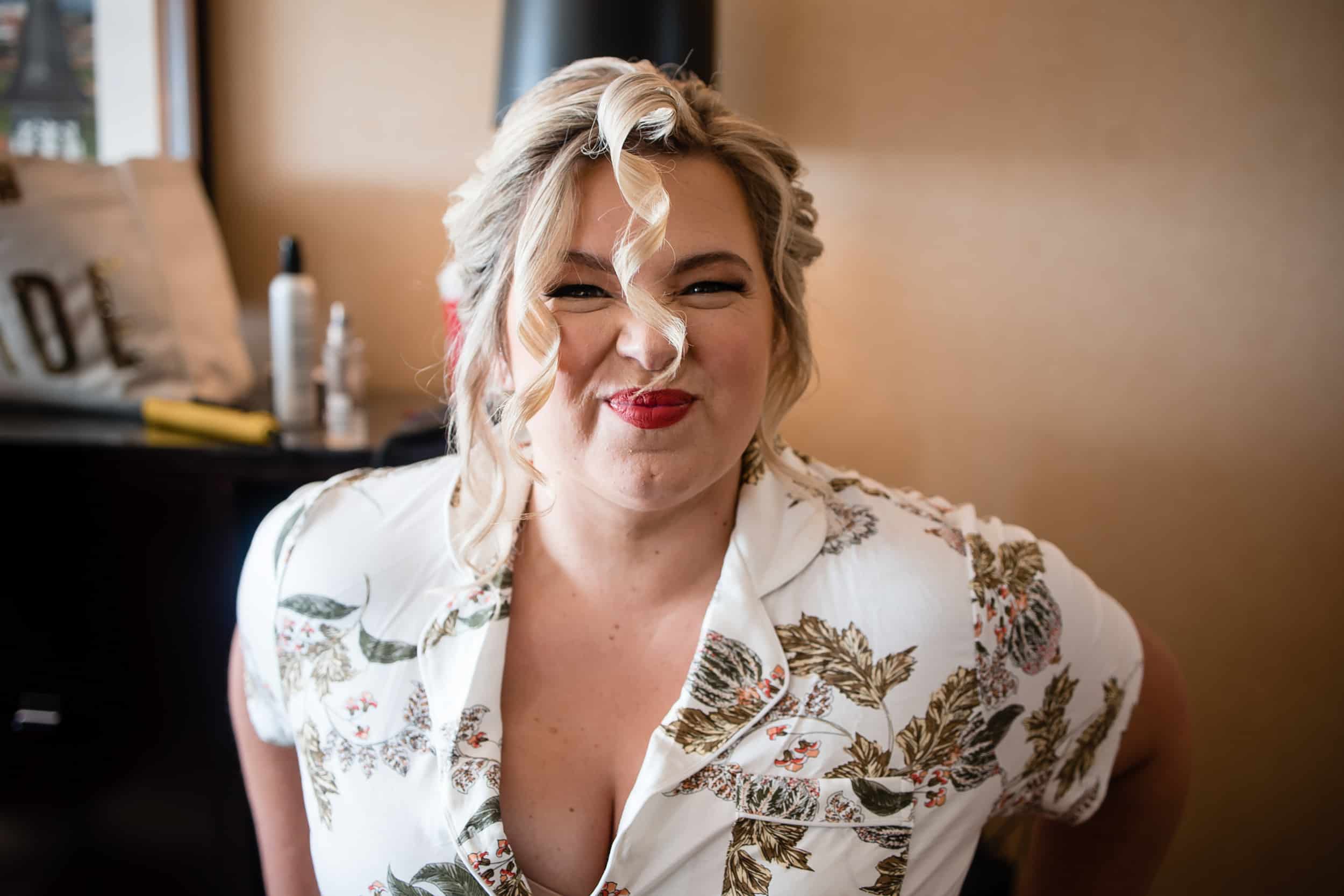 bride making funny face in Louisville hotel